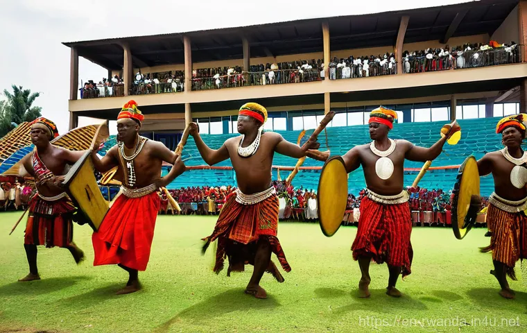 르완다 민속 음악 공연 일정 - **"Dynamic Intore Dance Performance in a Cultural Center"**
A group of Rwandan male Intore dance...